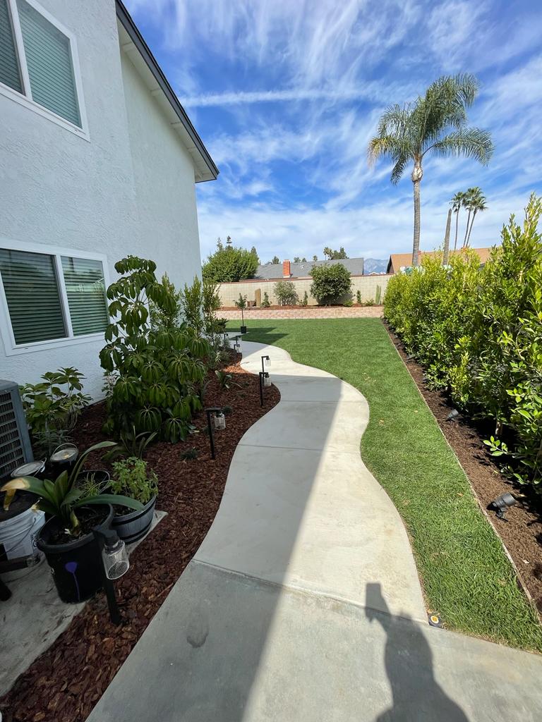 Outdoor kitchen island with built-in grill in Encino