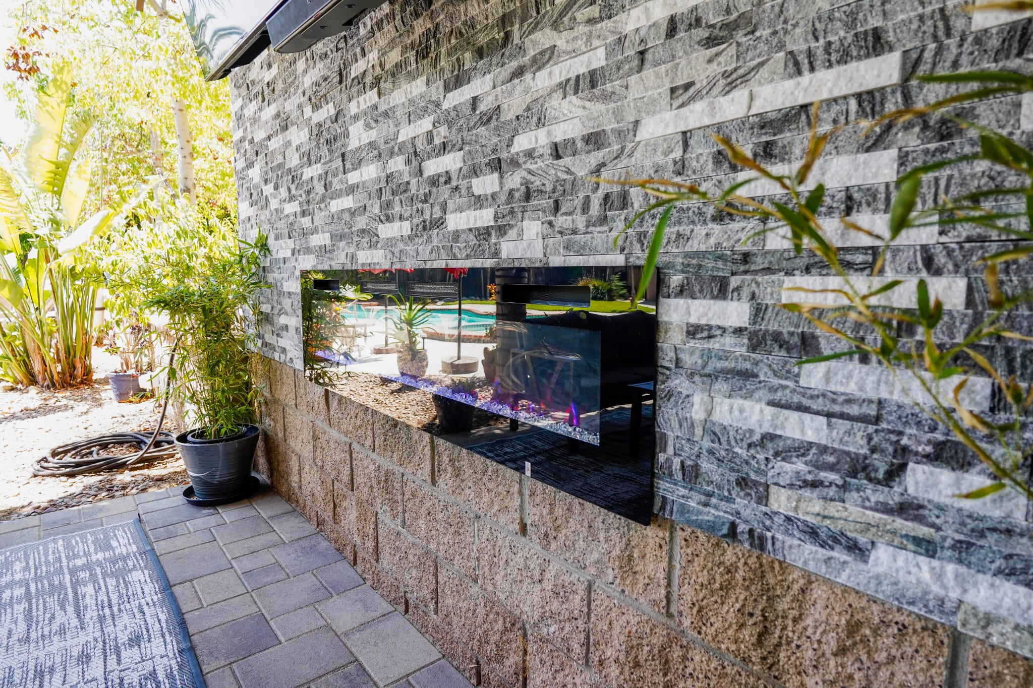 Stacked-stone outdoor kitchen in Woodland Hills