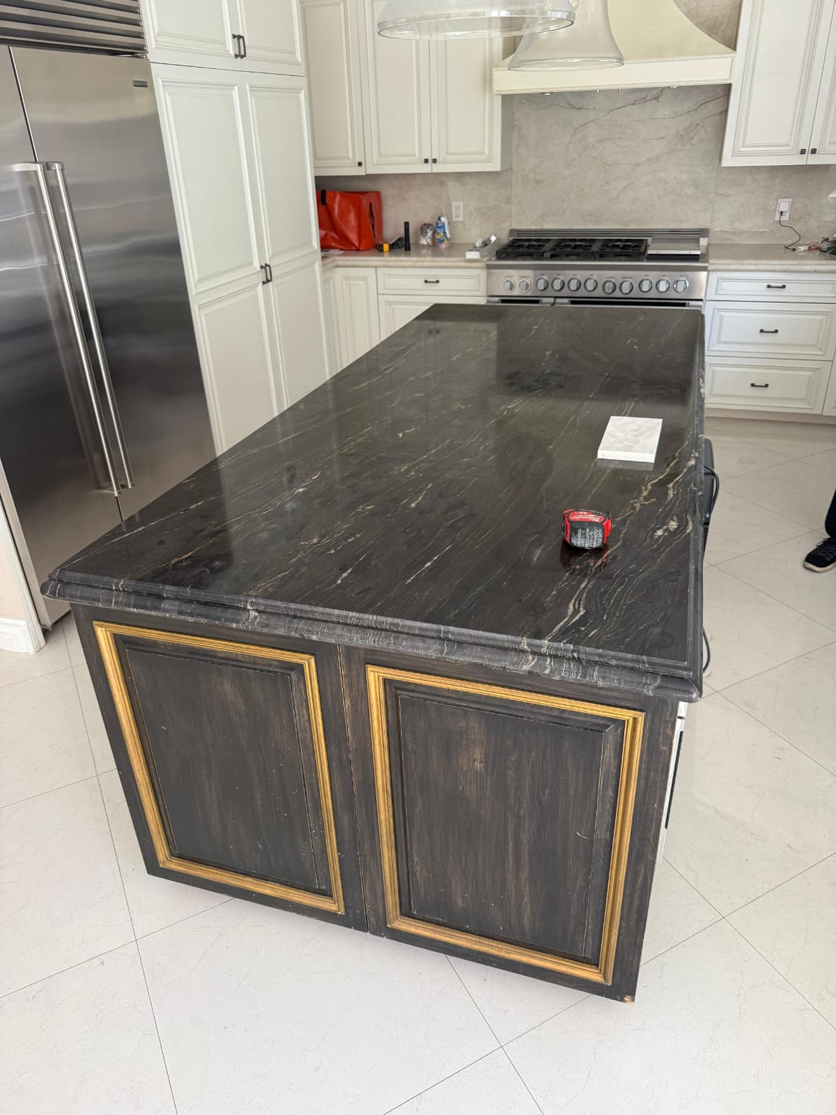 Kitchen island refinished to match the perimeter cabinetry