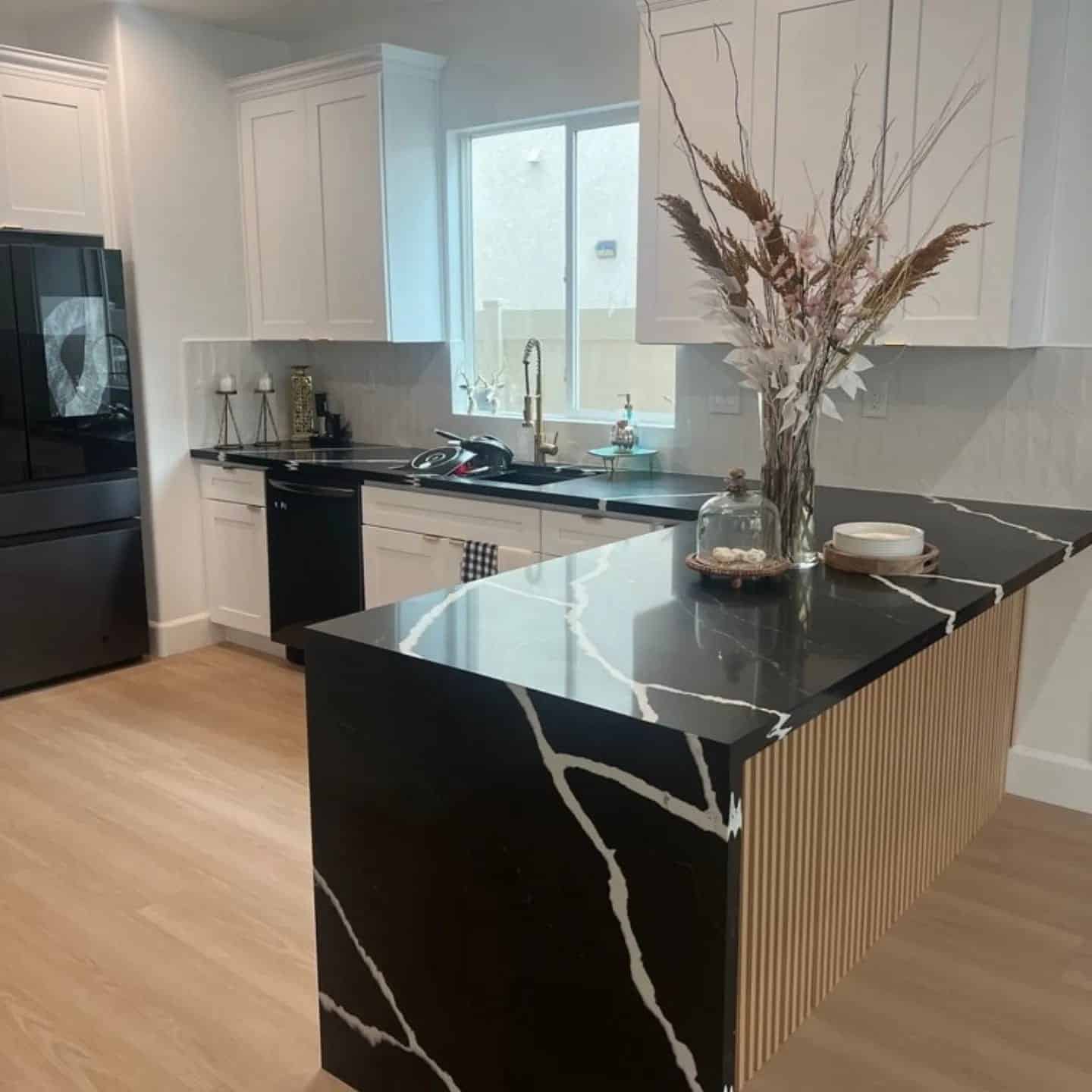 Open-plan kitchen and living space after whole house remodel in Canoga Park