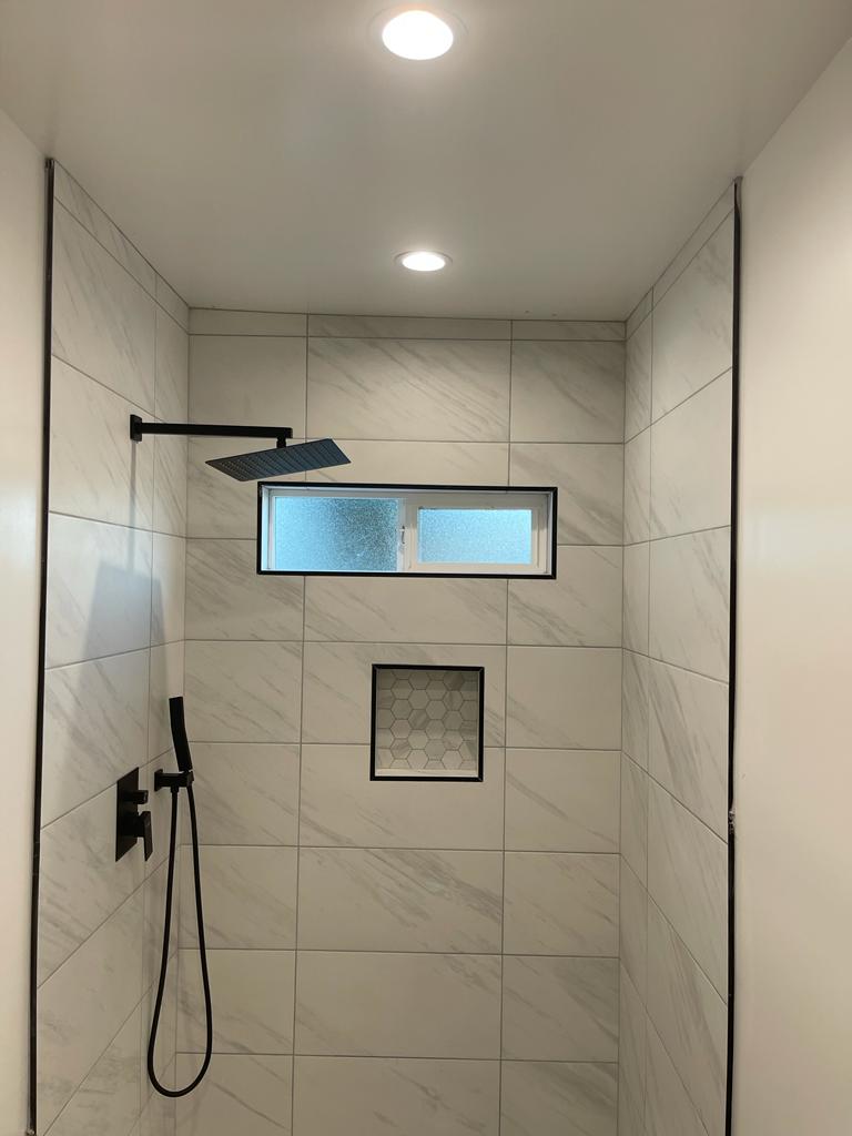Tiled walk-in shower in a Canoga Park whole house remodel